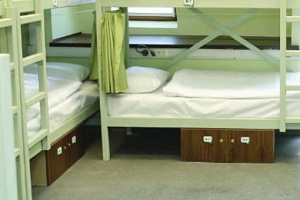 Кровать в 18-местном номере для мужчин
